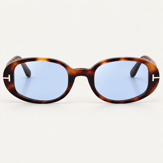 Óculos Alure da Solune, com formato oval, frente em tons de tartaruga e lentes azuladas.