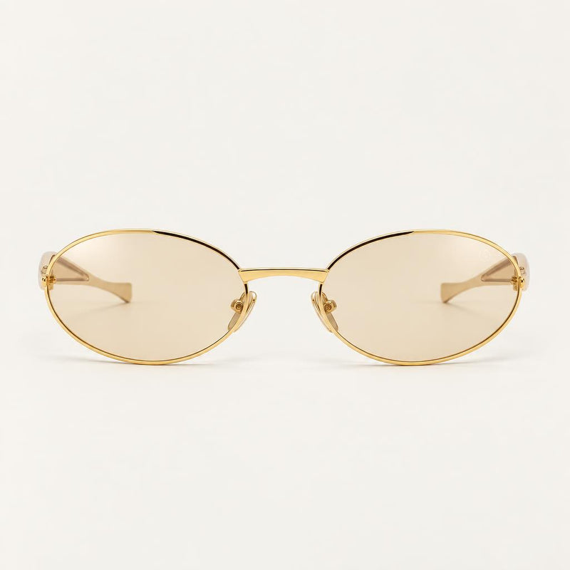 Óculos Demi da Solune, com lentes ovais claras e contorno fino dourado.