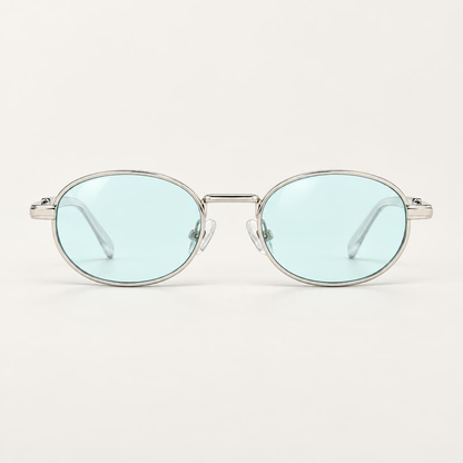 Óculos Mônaco da Solune, com lentes ovais azul-claras e contorno fino prateado.