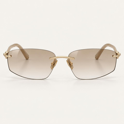 Óculos Maya da Solune, com lentes retangulares em degradê, sem aro aparente e detalhes dourados.